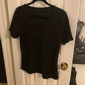 Black top with buttons.